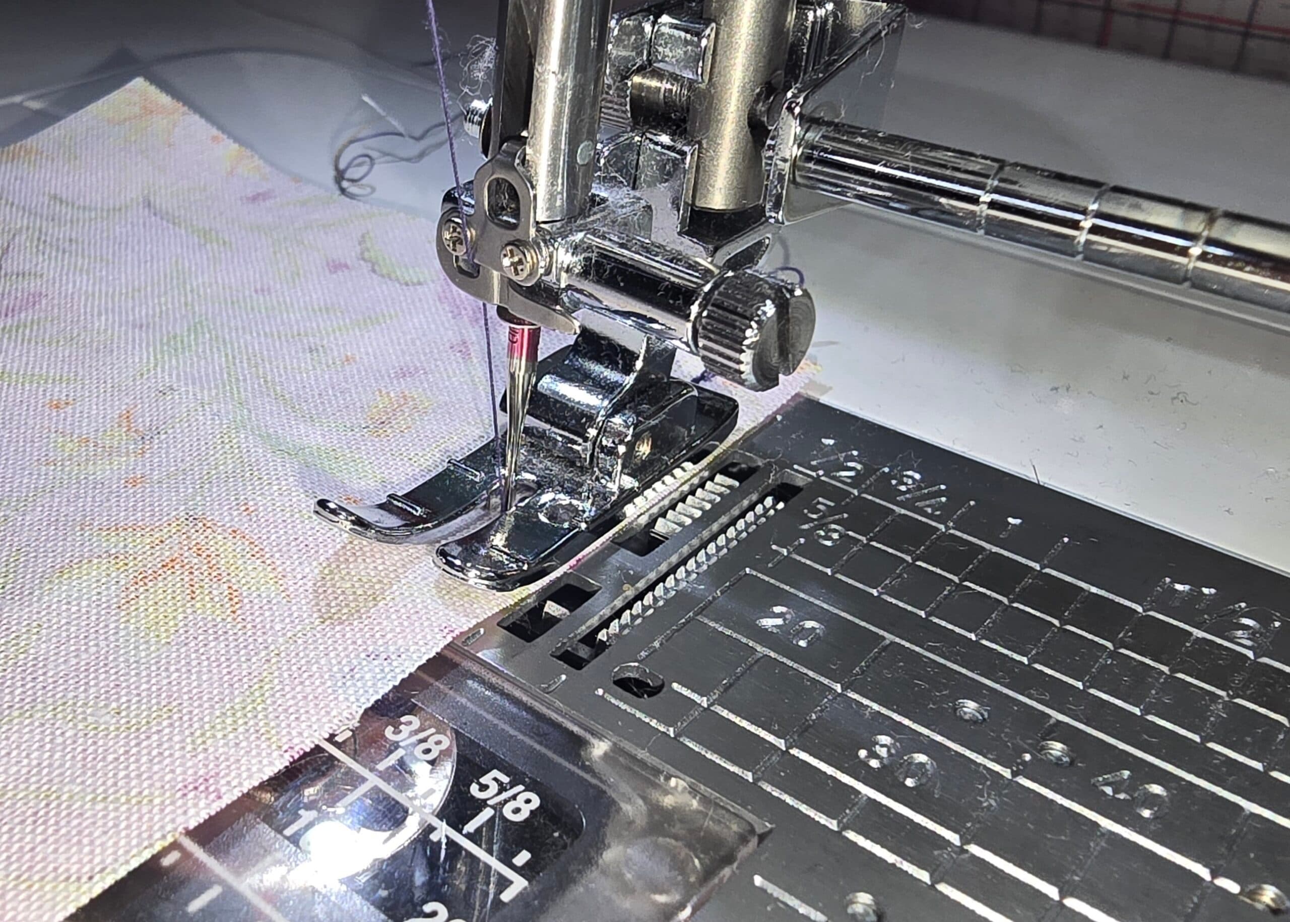 Beth is showing sewing the scant quarter inch allownace using the Janome HP foot and plate