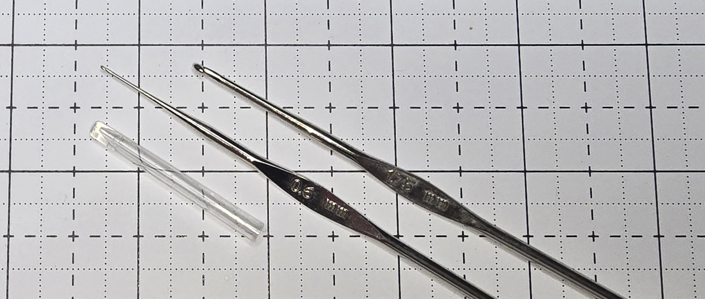 Elizabeth is showing you what a steel crochet hooks look like